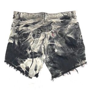 Distressed black Levi’s shorts